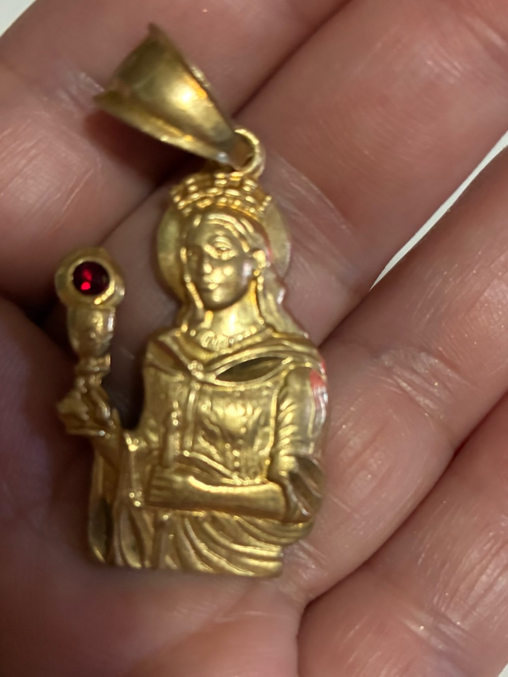Gold-Virgin  Pendant beautiful  with Red Accent very heavy it says 18k on back